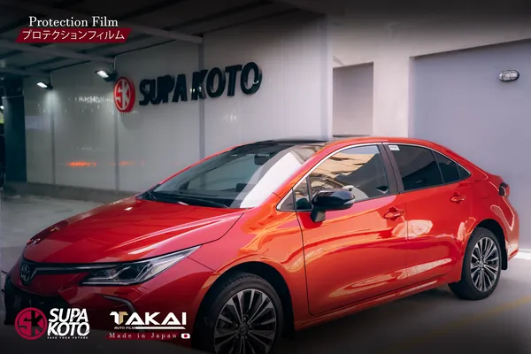 Detailed view of professional paint protection film installation 130